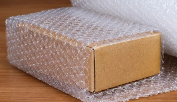 Carton wrapped in air bubble film
